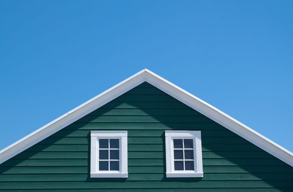 Dark Green House with White Trim